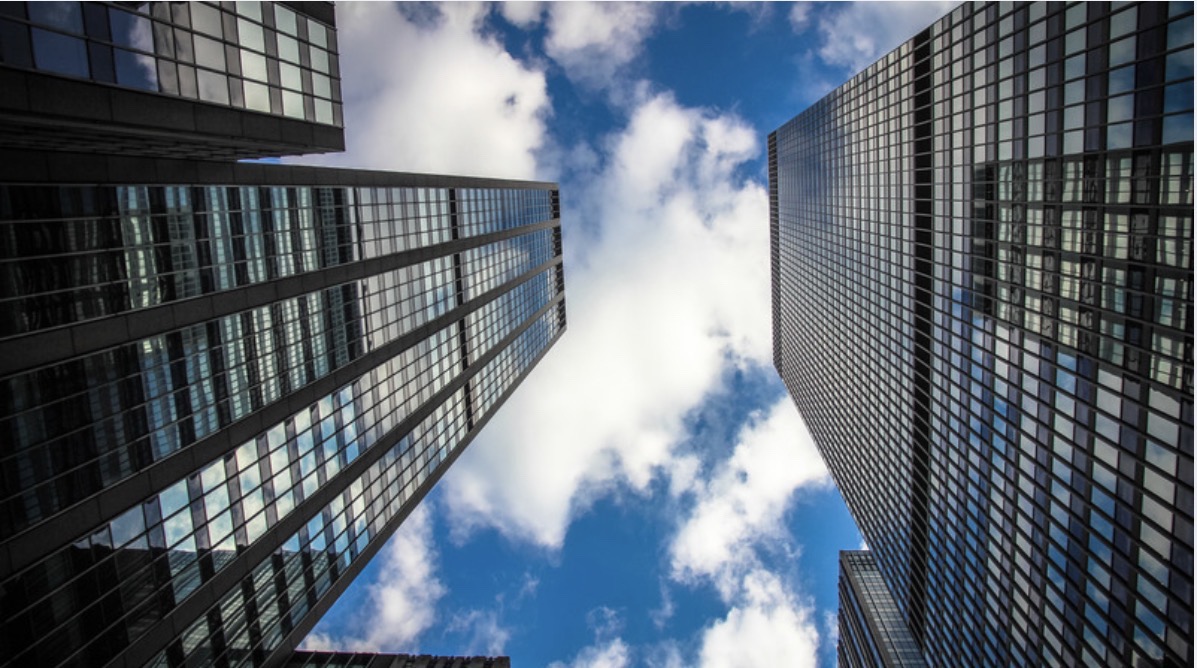 Looking upward between city office towers